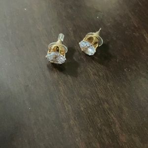 Girls gold  earrings with diamond never been used